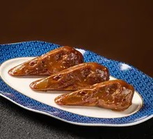 Spicy Duck Heads with Fire-Charred Sauce
