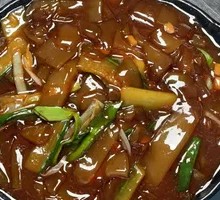 Stir-Fried Fresh Rice Noodles with Green Garlic Shoots