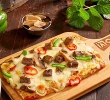 Hand-Torn Beef Pizza