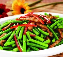 Stir-fried shredded pork with garlic shoots