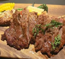Charcoal-Grilled Tomahawk Steak
