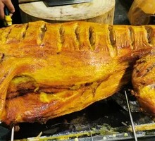 Whole Lamb Roasted Over Charcoal