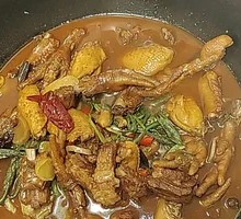Stewed Rooster in Iron Pot