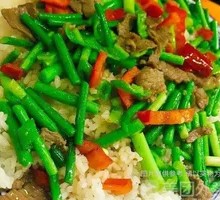 Stir-Fried Pork and Garlic Shoots over Rice