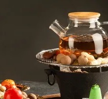 Tea Boiled by a Hearth