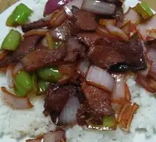Onion Stir-Fry with Pork over Rice