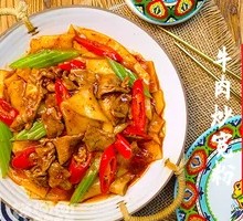 Stir-fried beef with wide rice noodles
