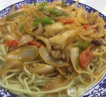 Onion Stir-Fry with Pork over Noodles