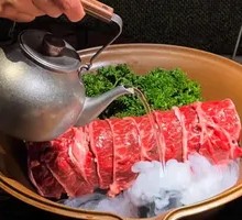 Freshly Sliced Steamed Meat in Bamboo Basket