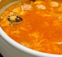 Tomato and Greens Meatball Soup