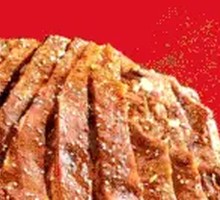 Signature Charcoal-Grilled Lamb Ribs