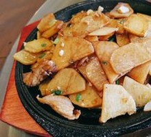 Grilled Potato on Iron Plate