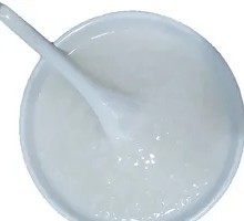 Freshly Boiled White Rice Porridge in Bowl