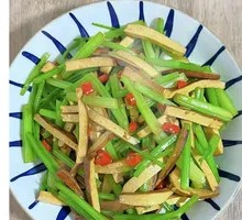 Stir-fried celery with fried tofu