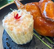 Mango-Infused Salmon with Glass-Braised Pigeon