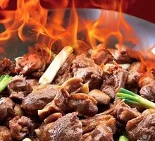 Flame-Infused Duck in Wine Sauce