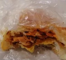 Pork-filled flatbread sandwich