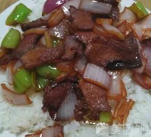 Onion Stir-Fry with Pork over Rice