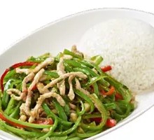 Stir-fried garlic shoots with pork over rice