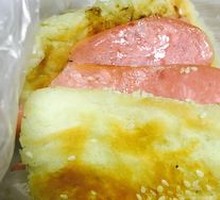 Braised flatbread with sausage