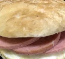 Burned Pancake with Old Ham and Fried Egg