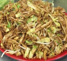 Stir-fried egg and shredded meat on flatbread