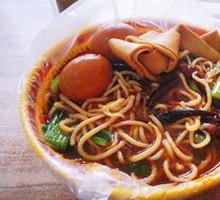 Hand-extruded noodle soup