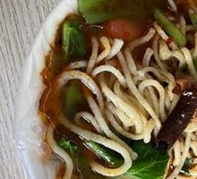 Hand-extruded noodle soup
