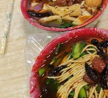Hand-extruded noodle soup