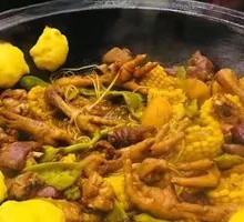 Stewed Rooster in Iron Pot