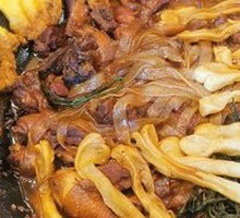 Stewed Rooster in Iron Pot