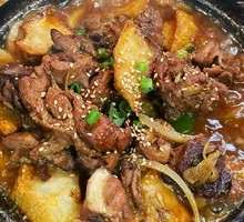 Stove Pot Chicken and Potato Pieces