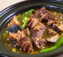 Braised Beef with Baby Bok Choy and Tofu Skin over Rice