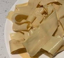 Oil-soaked tofu skin