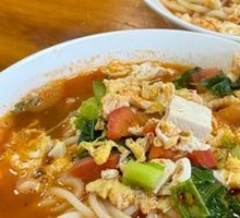 Hand-extruded noodle soup