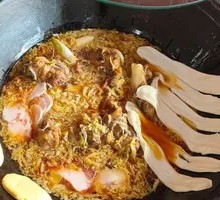 Stewed Pork Bone and Potato in Iron Pot