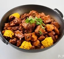 Stewed Pork Ribs and Chicken in Iron Pot