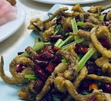 Dry-Fried Rice Cake with Squid Legs