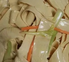 Oil-soaked tofu skin