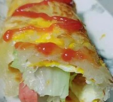 Hand-held Pancake with Tomato Sauce