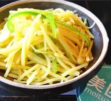 Sliced Potatoes with Green Pepper
