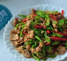 Stir-Fried Pork with Green Peppers over Rice