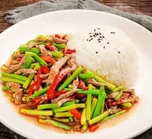 Stir-fried Beef with Garlic Shoots over Rice