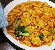 Stir-fried crispy rice cakes