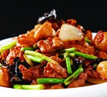 Stir-fried garlic shoots with pork