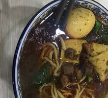 Hand-extruded noodle soup