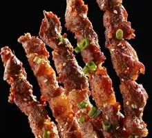 Charcoal-Grilled Lamb Skewers on Red Willow Branches