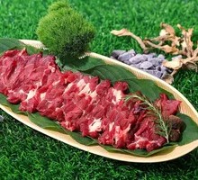 Freshly Sliced Tenderloin with Hanging Dragon