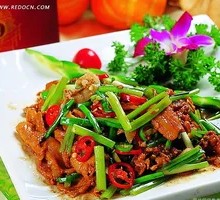 Stir-fried Garlic Shoots with Pork over Rice