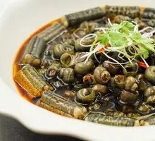 Stuffed Eel with Snail in Steamer